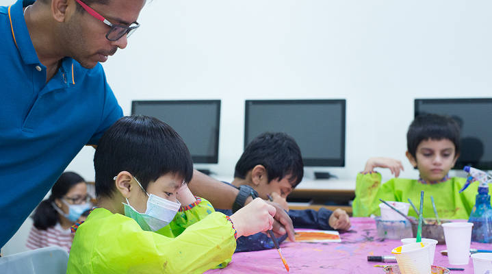 Teachers with students